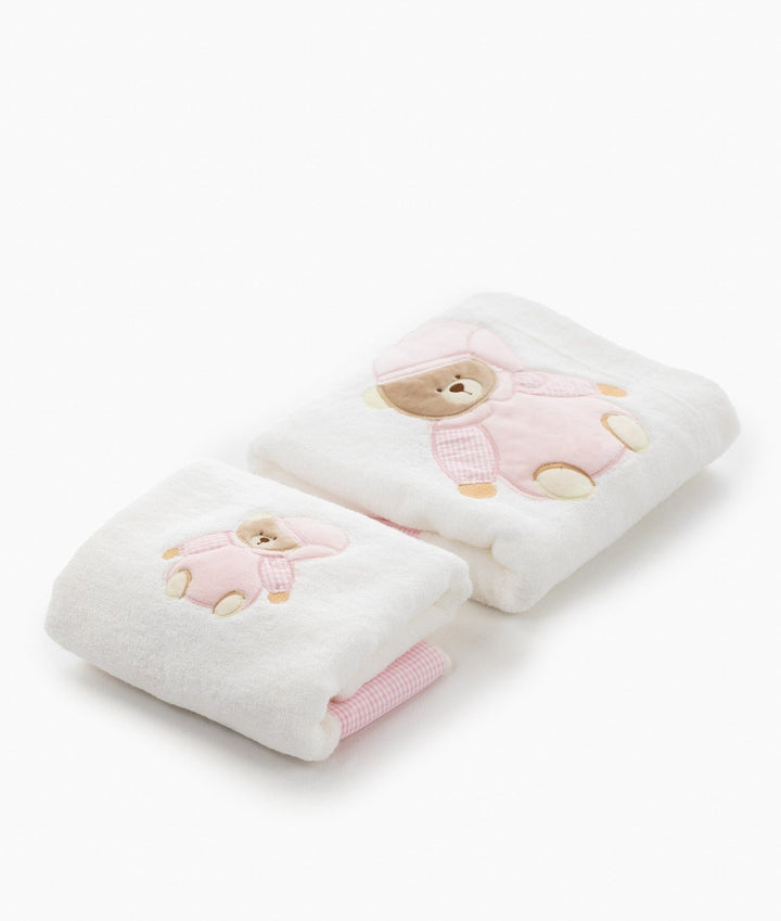 Two size white cotton baby towels with pink bear motifs and trim