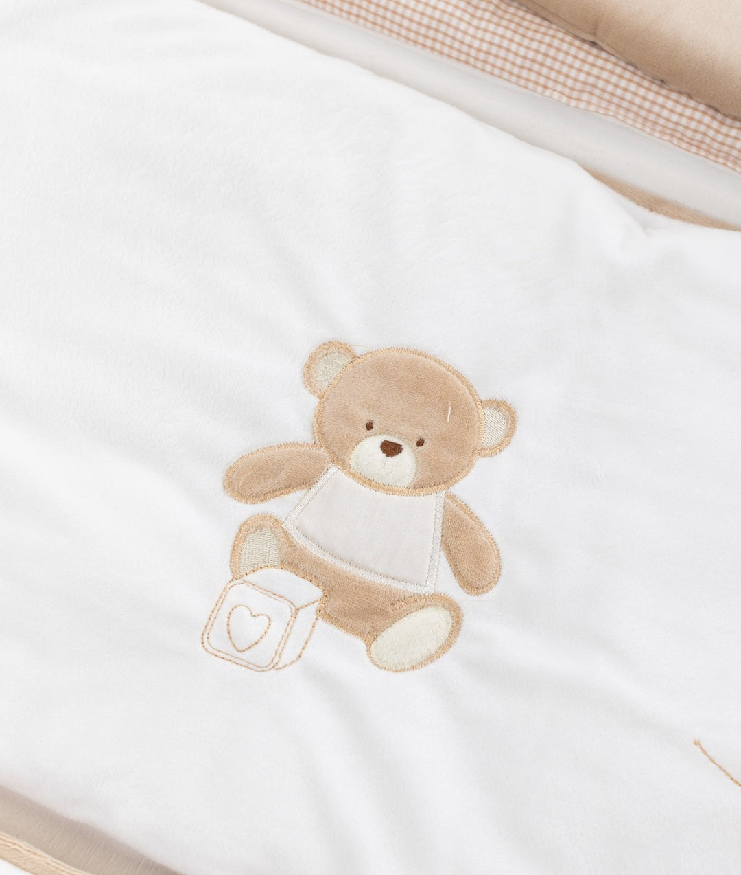 White and beige cot bumper set for baby cot