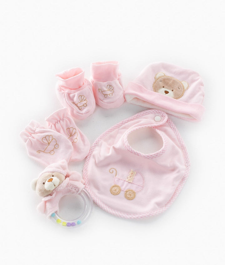 Complete 5-piece pink baby gift set flat lay