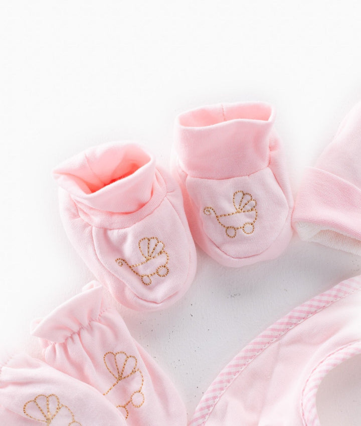 Pink baby mittens with gold embroidered carriage detail