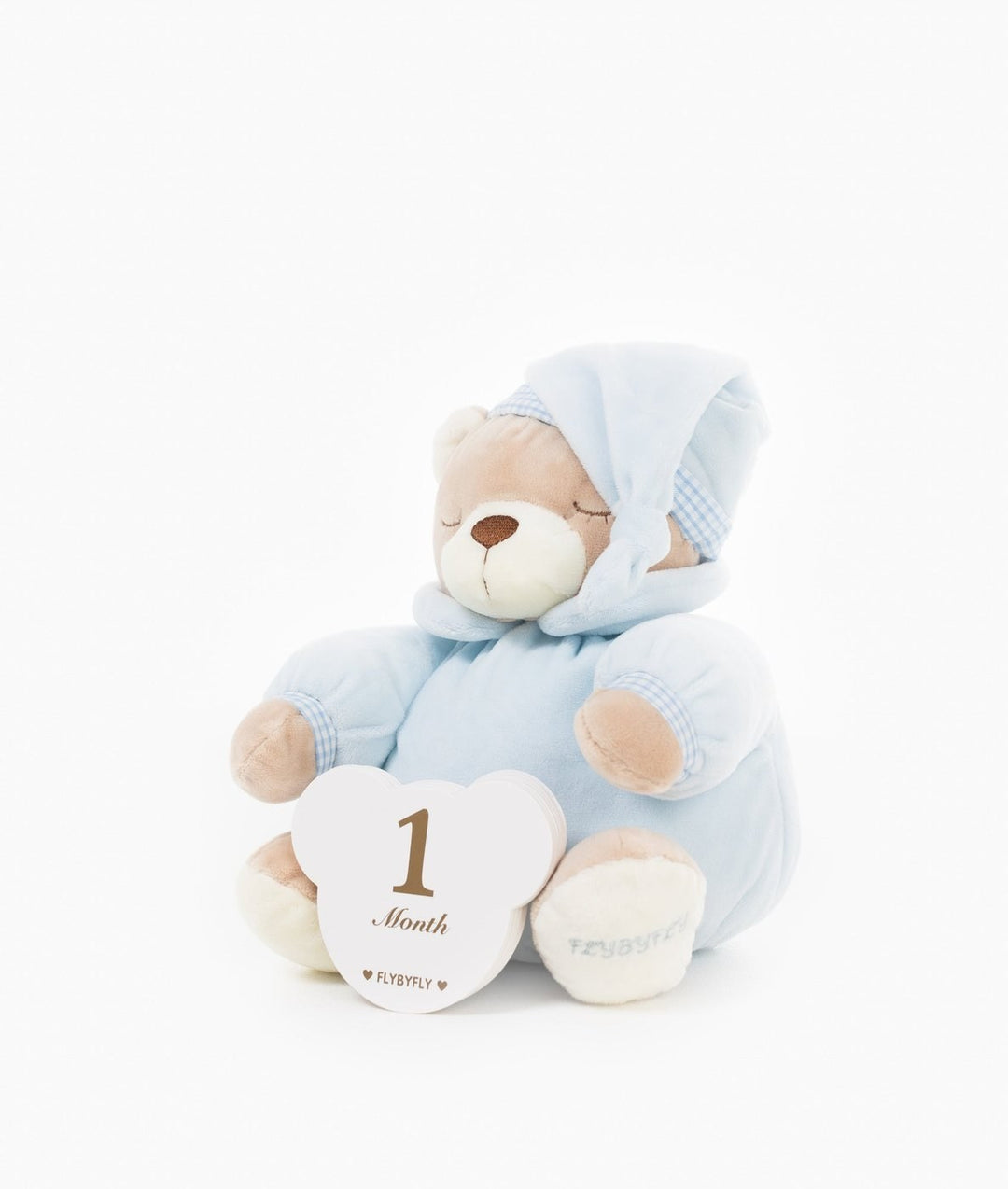 Blue teddy bear holding '1 Month' card with embroidered brand on foot sole