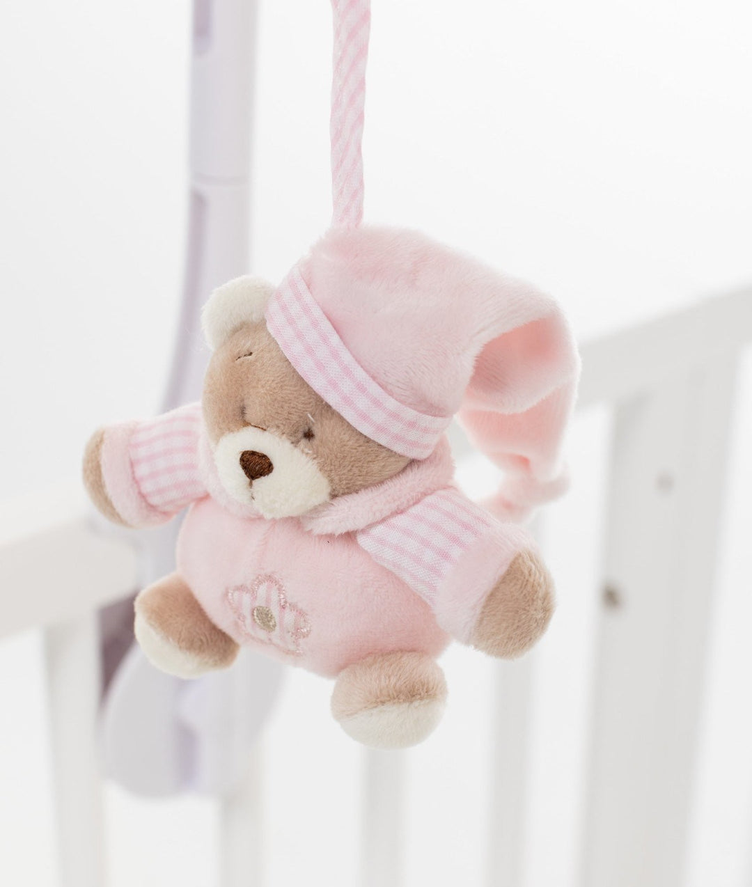 pink bear musical mobile with nightcap and striped pajama detail