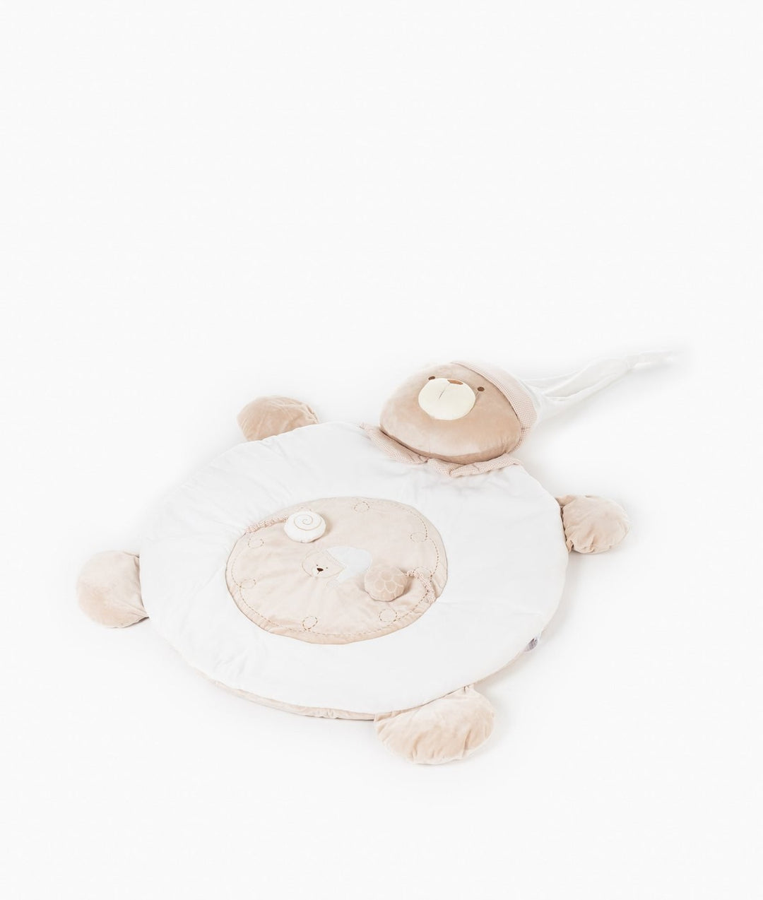 Round white plush playmat base with central activity area and detached bear pillow