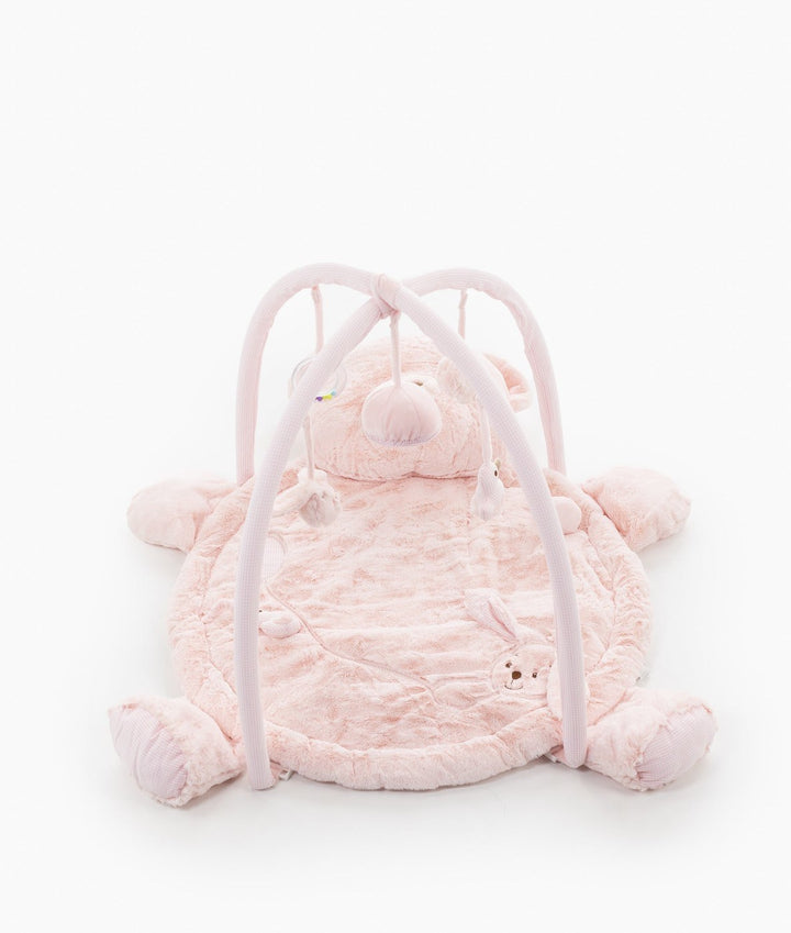 Front view of pink baby playmat showing detachable toy bar arches and soft padded edges