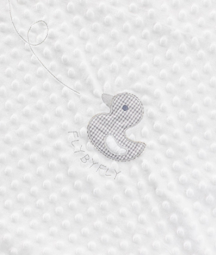 Grey gingham duck patch detail on white dotted baby blanket