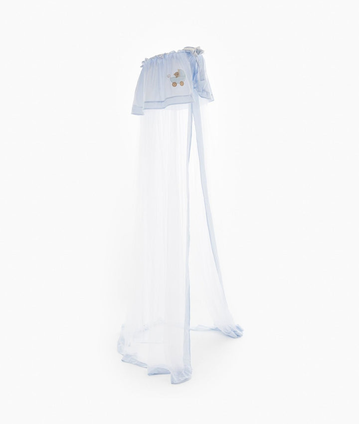 Light blue and white sheer tulle cot canopy with gathered header, baby carriage embroidery, and floor-length draping