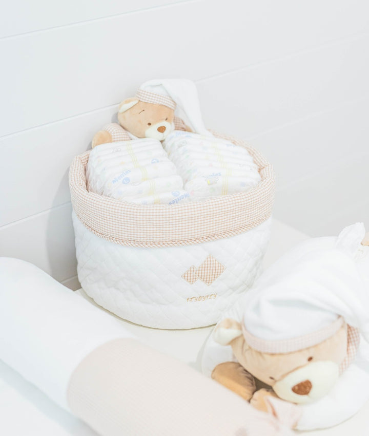 Baby nappy caddy for nursery in white and beige
