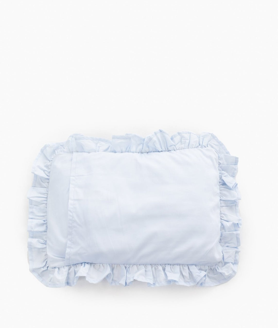 Back side of light blue cotton pillowcase with continuous gathered ruffle trim around perimeter and plain smooth fabric surface